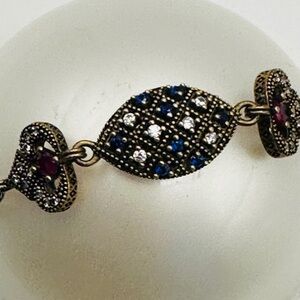 Elegant Vintage Gold-tone Bracelet with Blue and Red Accents